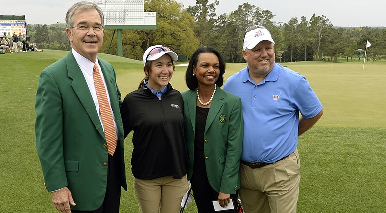 Augusta National member and former Secretary of State Condoleezza Rice poses with Masters chairman Billy Payne (left), Hunter Pate (Drive, Chip & Putt Girls 14-15 winner) and Pate's father, Jack, on Sunday in Augusta, Ga.