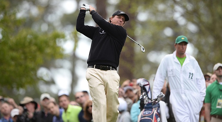 Phil Mickelson tees off during a practice round at Augusta National.