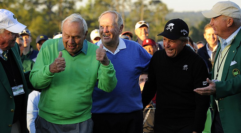 Arnold Palmer (left), Jack Nicklaus (center) and Gary Player (second from right) share a laugh after starting the 78th Masters.