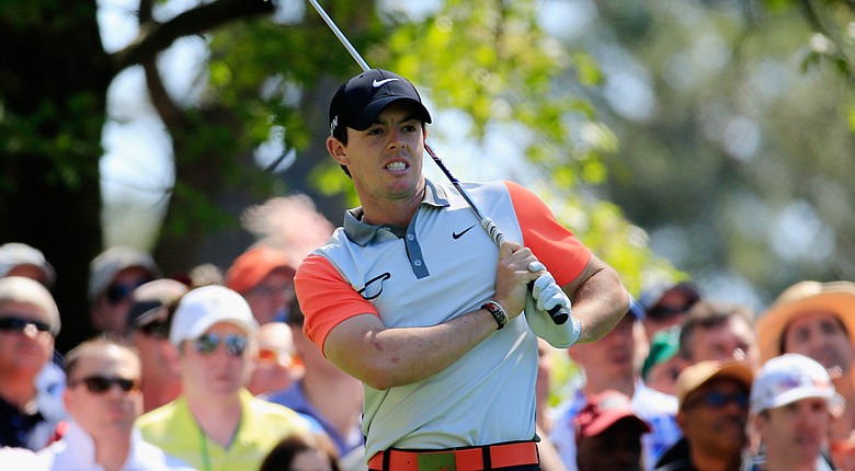 Rory McIlroy fired a 1-under 71 to sit three shots off the lead at the Masters.