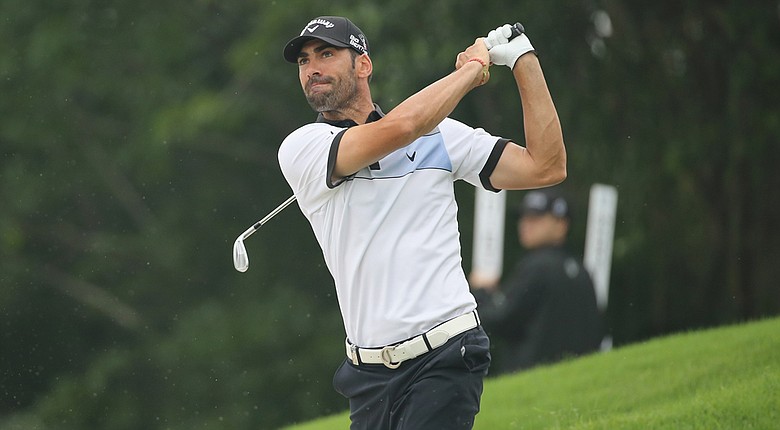 Alvaro Quiros in action during Round 1 of the Volvo China Open.