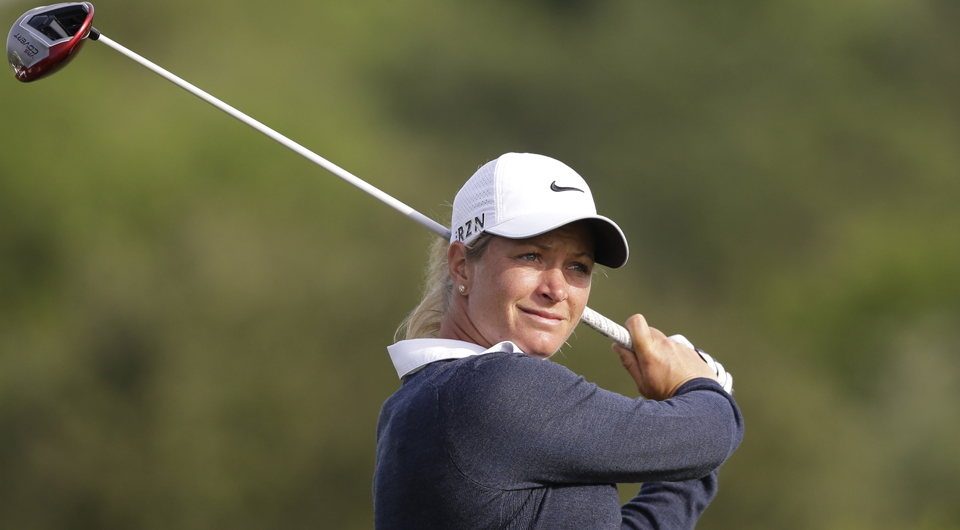 Still nursing a back injury, Suzann Pettersen scattered five birdies during a bogey-free round for a one-shot lead over four players including Michelle Wie after the first round of the North Texas LPGA Shootout.