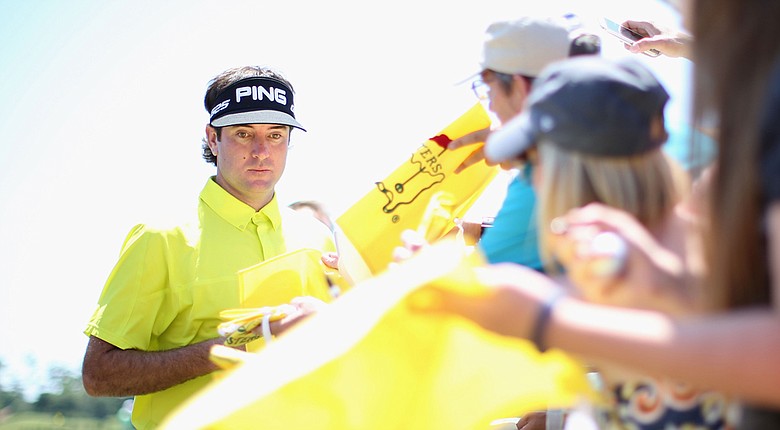 Reigning Masters champion Bubba Watson interacts with fans Tuesday at TPC Sawgrass in Ponte Vedra Beach, Fla., leading up to this week's PGA Tour's 2014 Players Championship.