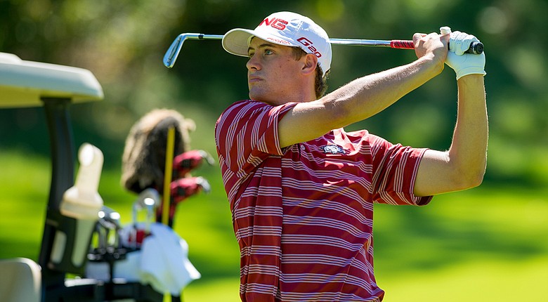 Arkansas' Taylor Moore is one shot off the individual lead at the Columbia (Mo.) Regional.