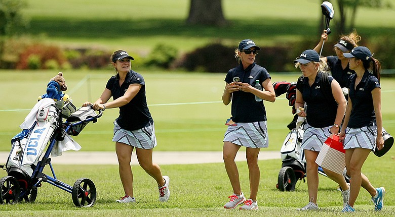 UCLA head coach, Carrie Forsyth, center, with her team at the Women's 2014 Golf Championships at Tulsa Country Club.