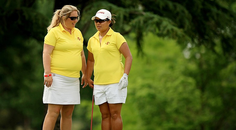 Iowa State head coach Christie Martens with Chonlada Chayanun during the final round of the 2014 NCAA Division 1 Women's Golf Championships at Tulsa Country Club.