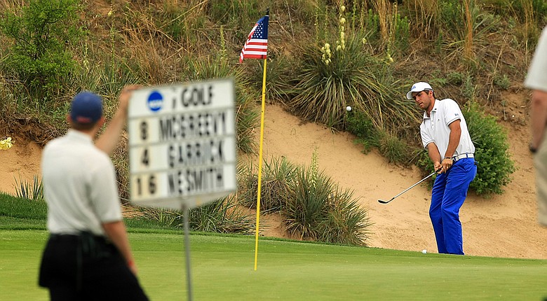UCLA's Jonathan Garrick chips up to No. 18 on Monday of the NCAA Men's Division 1 Championship at Prairie Dunes Country Club in Hutchinson, Kan.