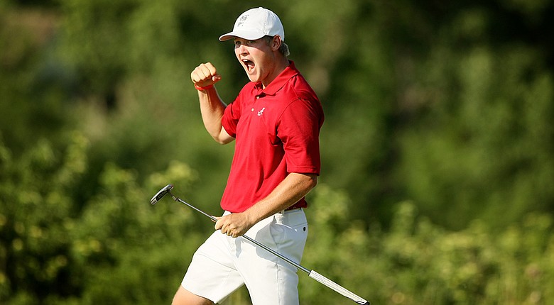Alabama's Trey Mullinax lets out roar as he clinches the winning point during Wednesday's final match of the NCAA Men's Division 1 Championship between Alabama and Oklahoma State at Prairie Dunes Country Club in Hutchinson, Kan.