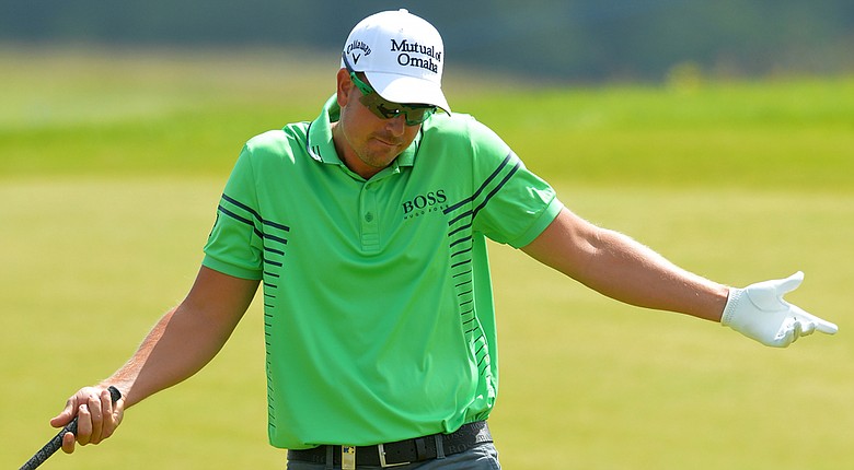 Henrik Stenson reacts after holing out for an eagle at the 7th green during the Nordea Masters.
