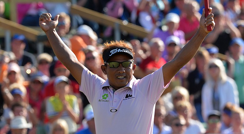 Thongchai Jaidee celebrates sinking the winning putt in the three-man playoff at the Nordea Masters.