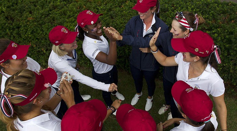 The U.S. team gathers before the start of Saturday four-ball matches at the 2014 Curtis Cup.