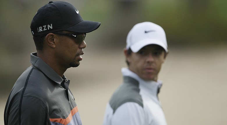 Tiger Woods and Rory McIlroy are listed as early co-favorites for the 2014 British Open.