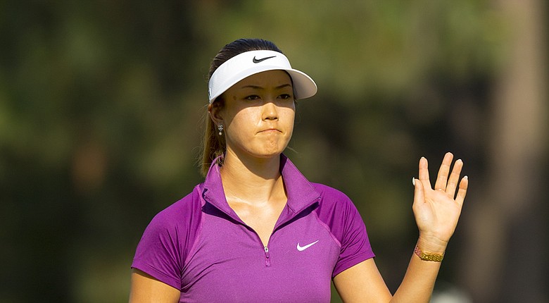 Michelle Wie will share a tee time with Paula Creamer and So Yeon Ryu during the LPGA's 2014 Walmart NW Arkansas Championship (shown here during last week's U.S. Women's Open win).