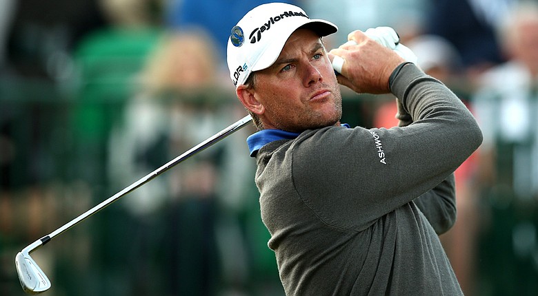 Robert Karlsson tied for the lead with a birdie at No. 16.