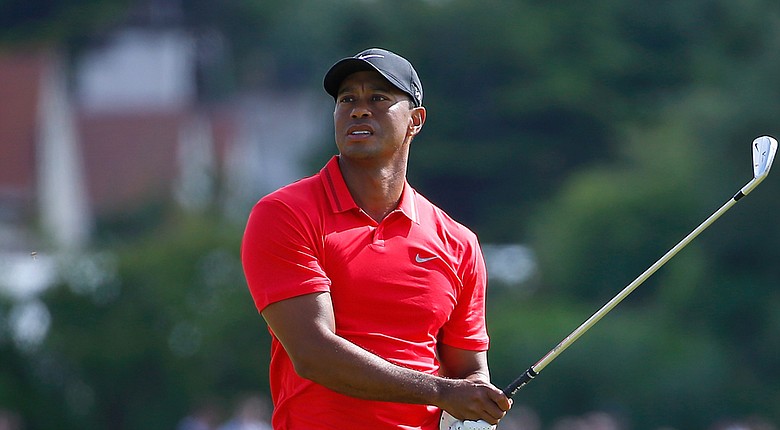 Tiger Woods' follow through might not be an issue, but his backswing has gotten shorter because he says, "I can't turn that far," in the wake of back March 2014 surgery.