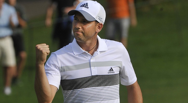 Sergio Garcia celebrates his birdie at 18 – his seventh consecutive to end the round – as he shot a 9-under 61 to take the lead at the WGC-Bridgestone Invitational.