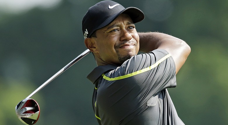 Tiger Woods will play with Bubba Watson and Jimmy Walker in the third round of the WGC-Bridgestone Invitational on Saturday.