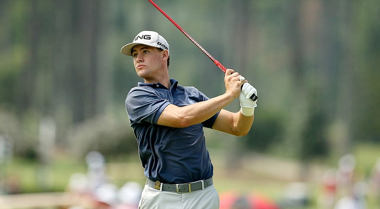 Taylor Moore shared medalist honors with Lee McCoy after firing a 2-under 69 on Tuesday at the U.S. Amateur.