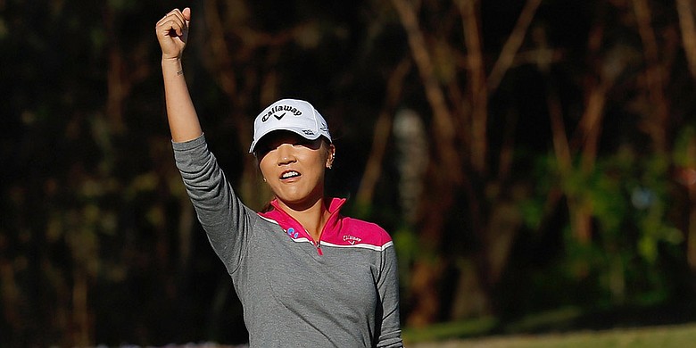 Lydia Ko pumps a fist during the final round of the Coates Golf Championship, where a runner-up finish helped her take the top spot in the Rolex Rankings.