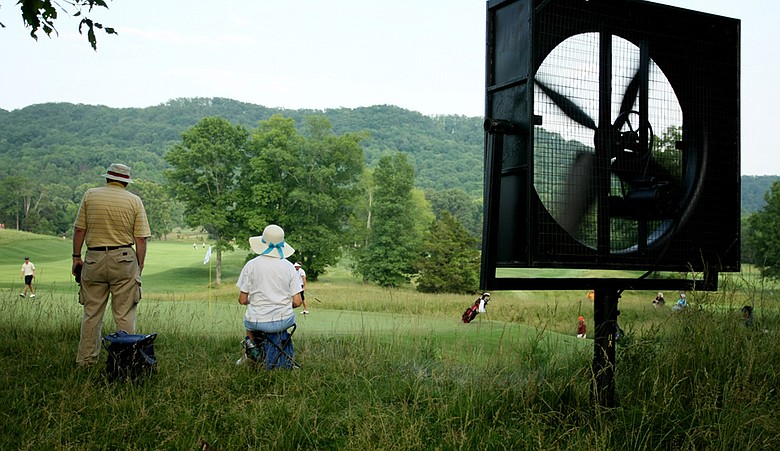 Spectators watch NCAA Championship action from just off No. 11 at The Honors Course.