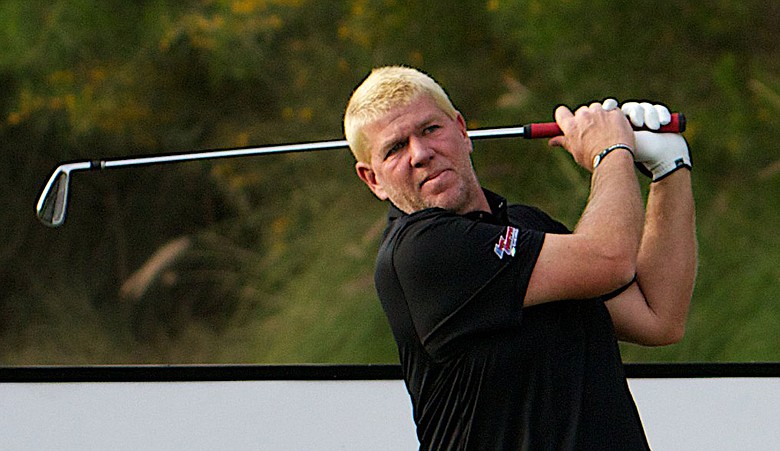 John Daly plays a shot during first round of Qatar Masters.