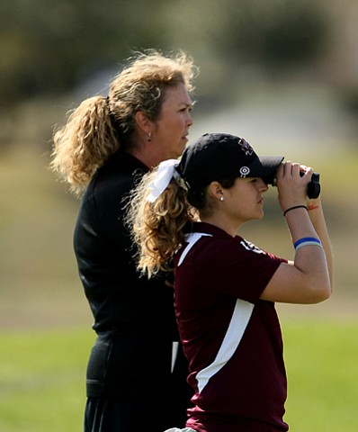 Ally McDonald of Mississippi State with head coach Ginger Brown-Lemm during the second round. Mississippi State is in 14th place at 31-over heading into the final round.
