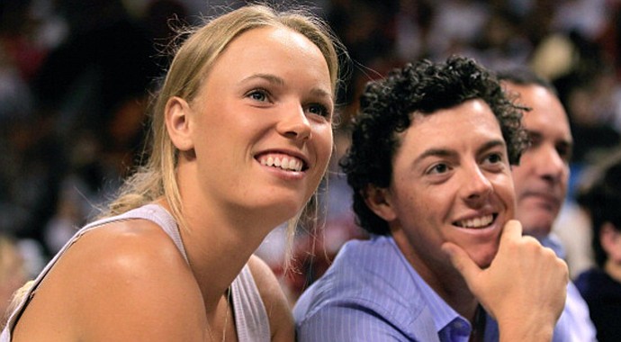 Rory McIlroy and girlfriend Caroline Wozniacki have sparked engagement rumors once again after she was spotted wearing a huge diamond on her left ring finger in Australia on Friday.