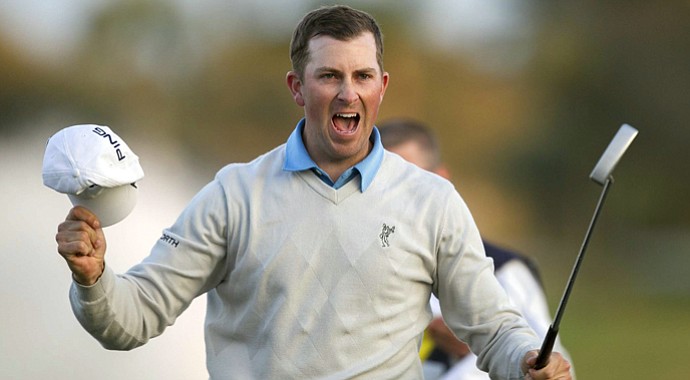 Michael Thompson celebrates his Honda Classic victory in the wind Sunday, March 3, 2013, in Palm Beach Gardens, Fla.