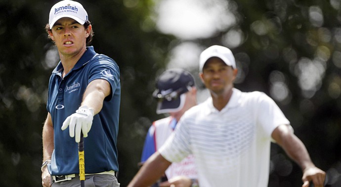 Rory McIlroy and Tiger Woods during the Tour Championship on Thursday, Sept. 20, 2012 in Atlanta.