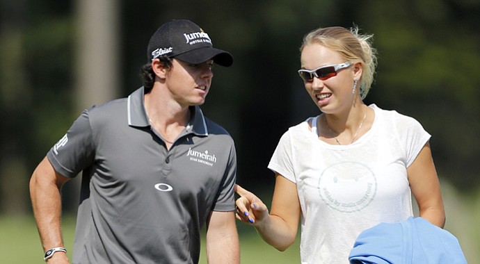 Rory McIlroy and Caroline Wozniacki during the Pro Am round of the Deutsche Bank Championship on Thursday, Aug. 30, 2012, at TPC Boston in Norton, Mass.