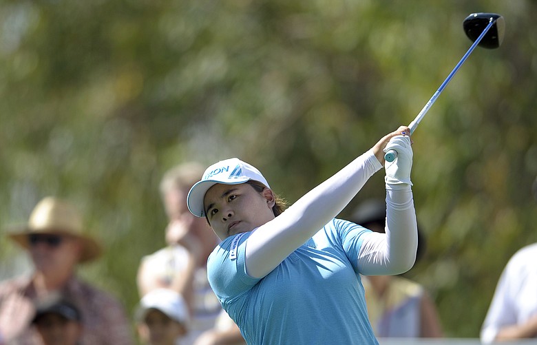Inbee Park, of South Korea, watches her tee shot on the ninth hole during the third round of the LPGA Kraft Nabisco Championship.