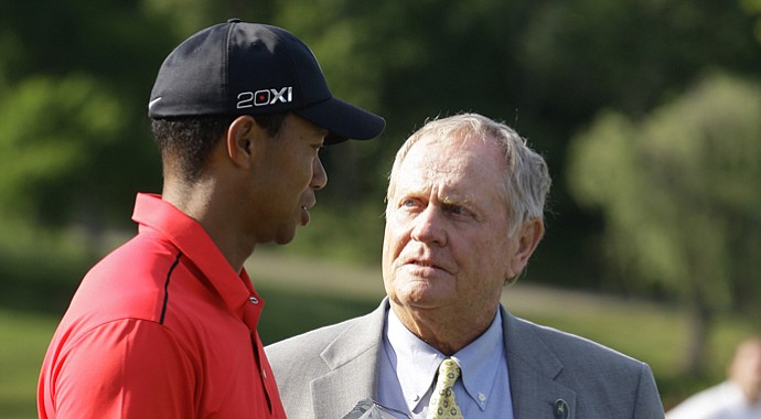 Tiger Woods (left) talks with Jack Nicklaus after winning the 2012 Memorial.