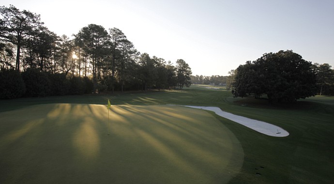 The first hole at Augusta National, Tea Olive, where players begin the Masters.
