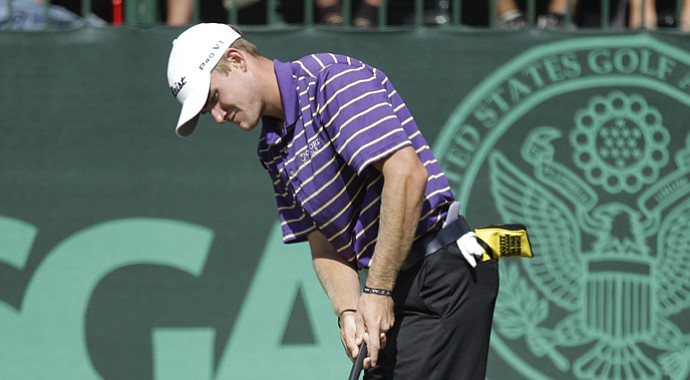 A putter cover sticks out of John Peterson's pocket during the 2012 U.S. Open.