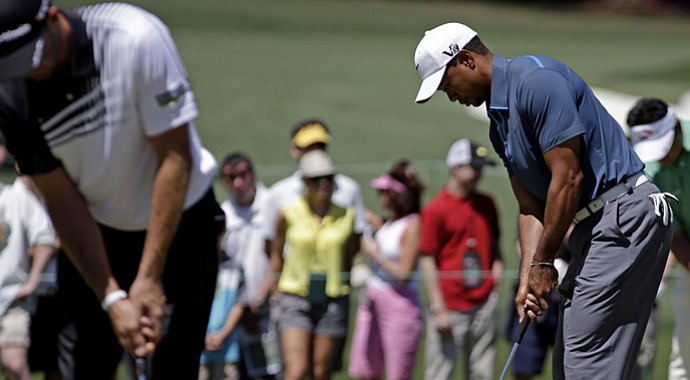 Tiger Woods prepares among his peers for the third round of the 2013 Masters.