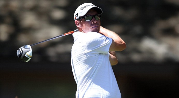 Brian Davis, of England, hits a tee shot on the 15th hole during the first round of the RBC Heritage at Harbour Town Golf Links.