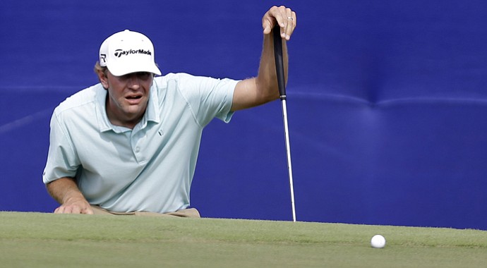 Lucas Glover reads a putt during the 2013 Zurich Classic of New Orleans.