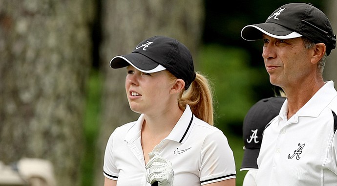 Junior Stephanie Meadow and head coach Mic Potter of the Alabama Crimson Tide during practice for the 2013 NCAA D-I women's championships.