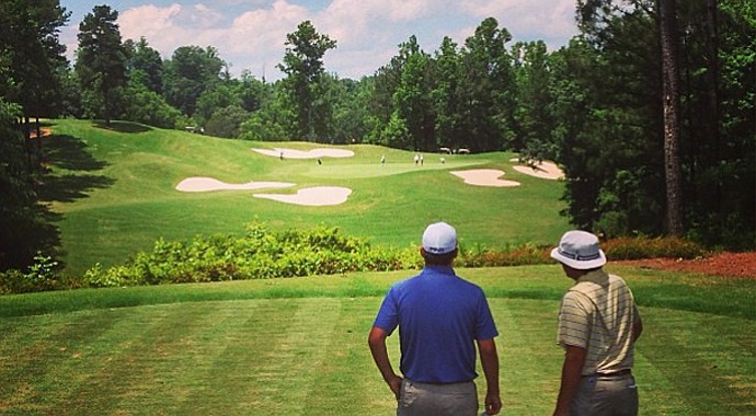 Scott Wolfes, left, at Hole No. 5 during U.S. Open sectional qualifying at Hawks Ridge Golf Club in Ball Ground, Ga.