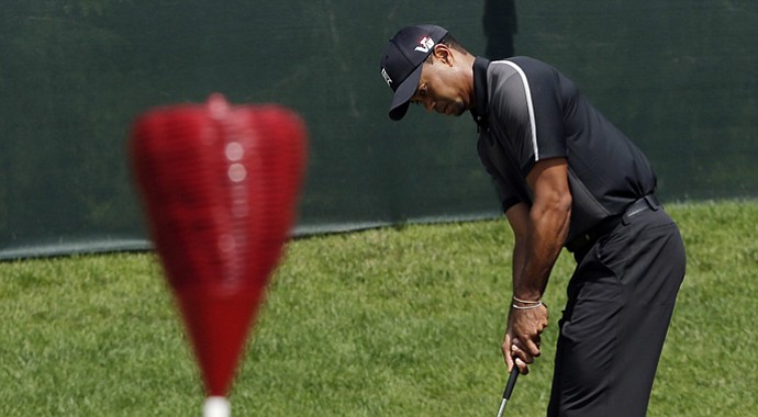 Tiger Woods practices for the 2013 U.S. Open at Merion Golf Club in Ardmore, Pa.