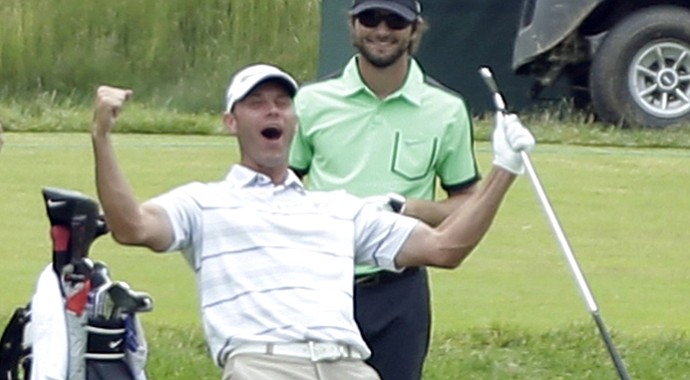 A hole-in-one gets Shawn Stefani to celebrate on the 71st hole of his 2013 U.S. Open at Merion Golf Club.