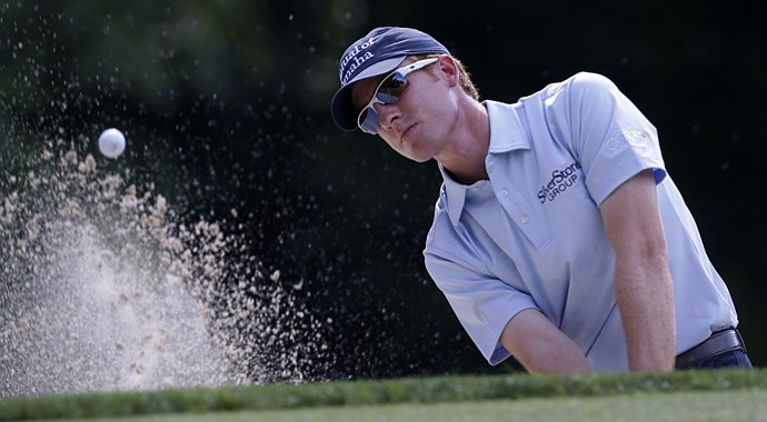 Roberto Castro hits out of a bunker on the 12th hole during the second round of the AT&T National at Congressional.