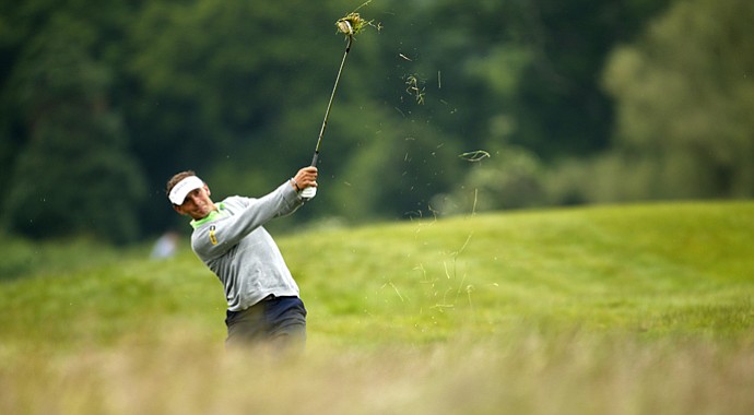 Joost Luiten of the Netherlands plays out of the rough on the second hole during round three of the Irish Open.