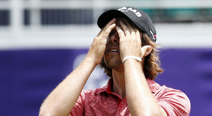 Aaron Baddeley of Australia reacts after missing a putt on No. 18 during the first round of the 2013 St. Jude Classic, where he missed the cut.