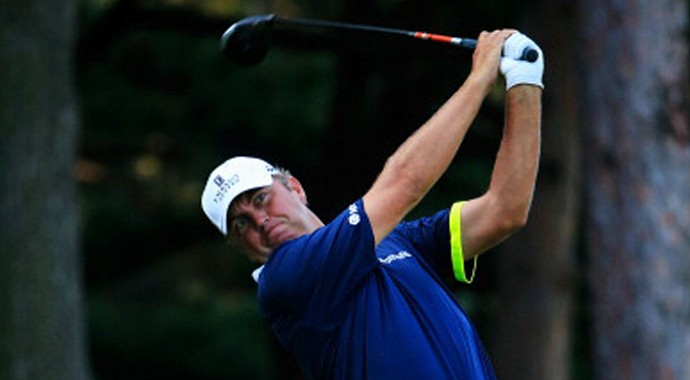 Bo Van Pelt hits his tee shot on the fourth hole during the first round of the 95th PGA Championship.