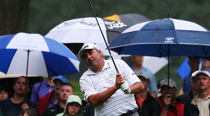 Angel Cabrera watches his tee shot on the 11th hole during the second round of the 95th PGA Championship.