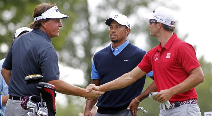 Phil Mickelson, Tiger Woods and Adam Scott before beginning their first rounds at the Deutsche Bank Championship Friday at TPC Boston.