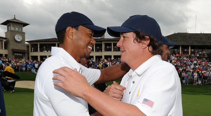 Tiger Woods and Jason Dufner celebrate the U.S.' win in the 2013 Presidents Cup at Muirfield Village.