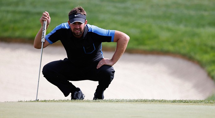 Scott Jamieson lines up a putt on the 14th green during the third round of the Portugal Masters.