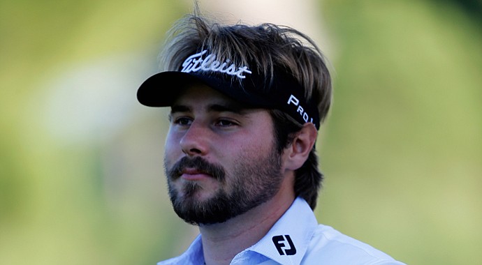 Victor Dubuisson looks on before he hits his second shot the 13th hole during the third round of the Turkish Airlines Open.